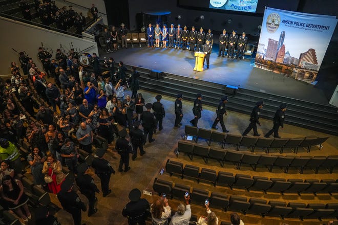 The Austin Police Department 151st Cadet Class files in for their graduation ceremony at Bannockburn Church on Friday, April 19, 2024 in Austin.