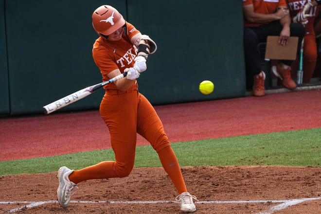 Texas Longhorns catcher Reese Atwood (14) swings at a pitch during the game against Iowa State at Red and Charline McCombs Field on Friday, April 26, 2024 in Austin.