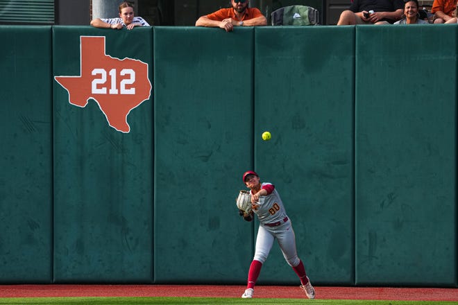 Iowa State outfielder Milaysia Ochoa (00) throws a ball from the outfield during the game against the Texas Longhorns at Red and Charline McCombs Field on Friday, April 26, 2024 in Austin.
